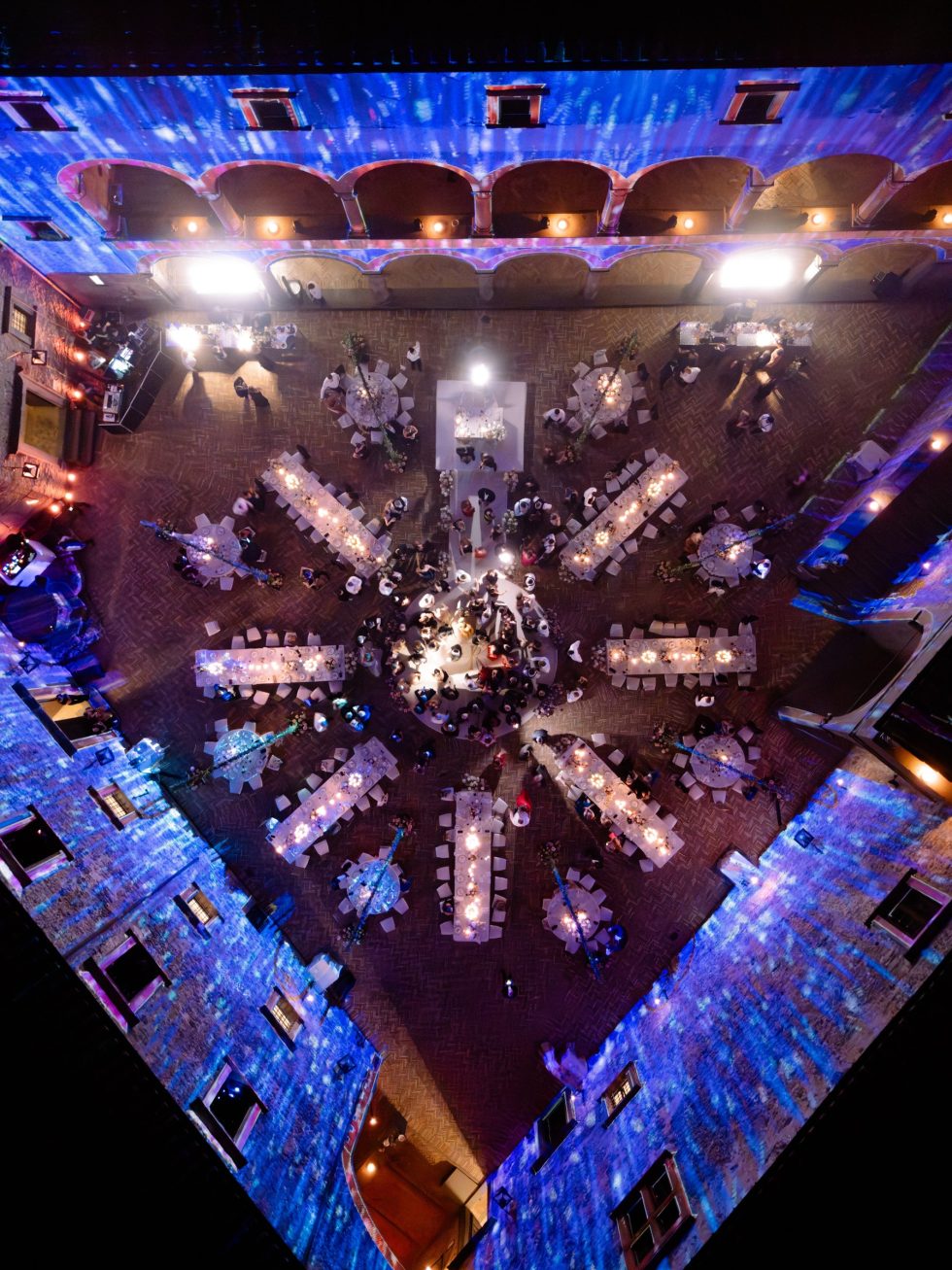The wedding dinner in the courtyard of Castello Odescalchi, seen from above at night