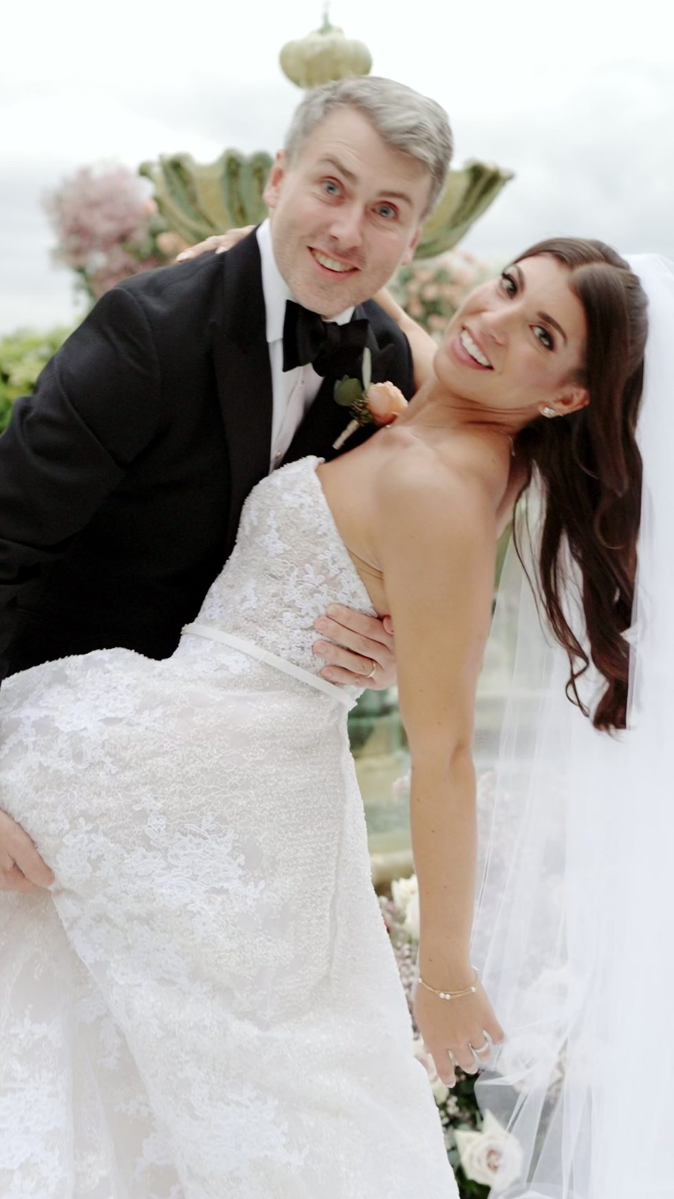 The newlyweds laughing together after the ceremony at Il Borro
