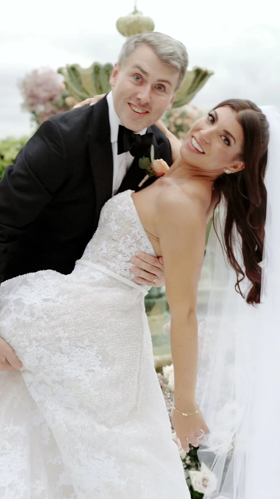The newlyweds laughing together after the ceremony at Il Borro