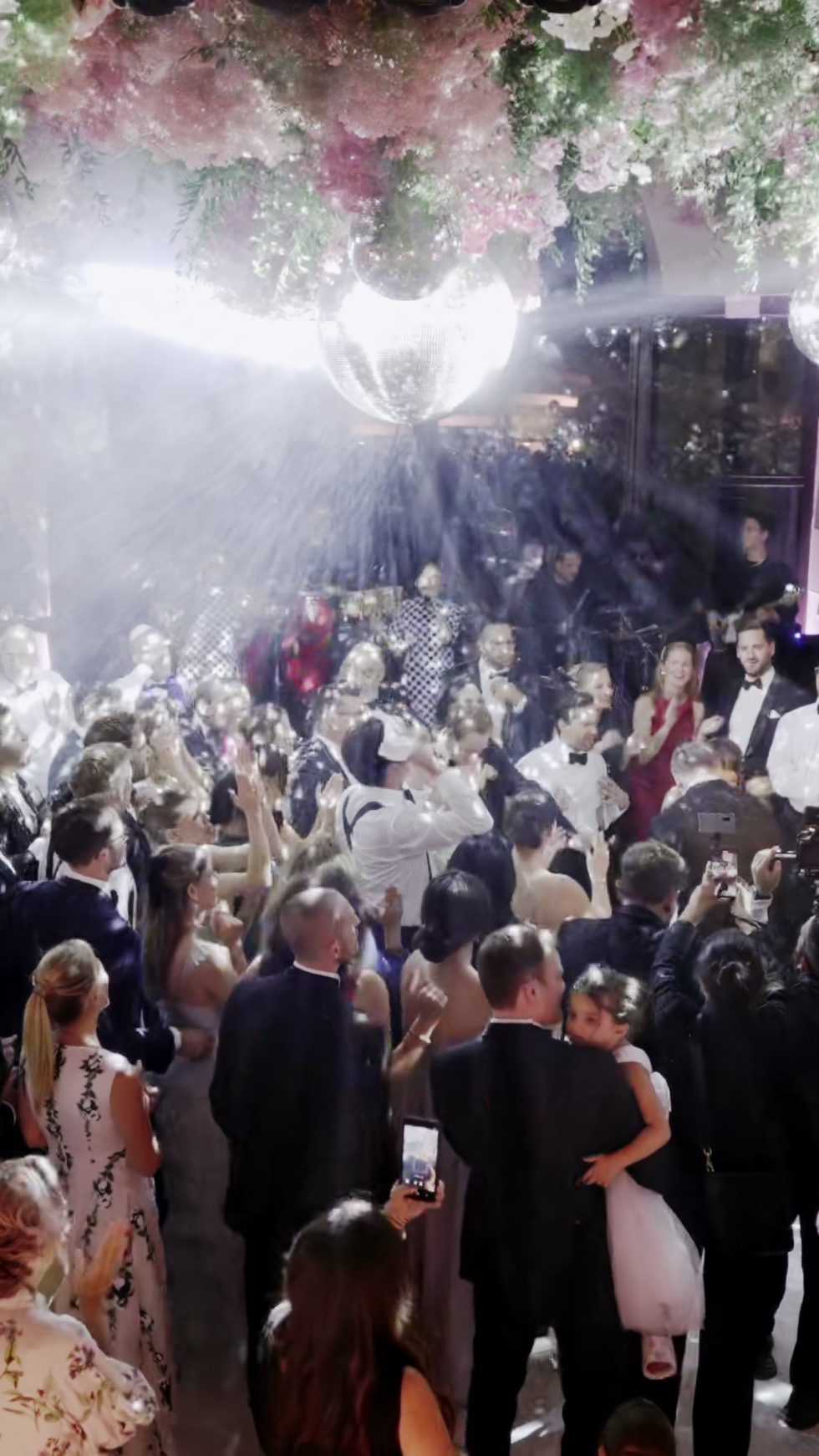 The dance floor beneath a canopy of flowers at the Il Borro wedding party