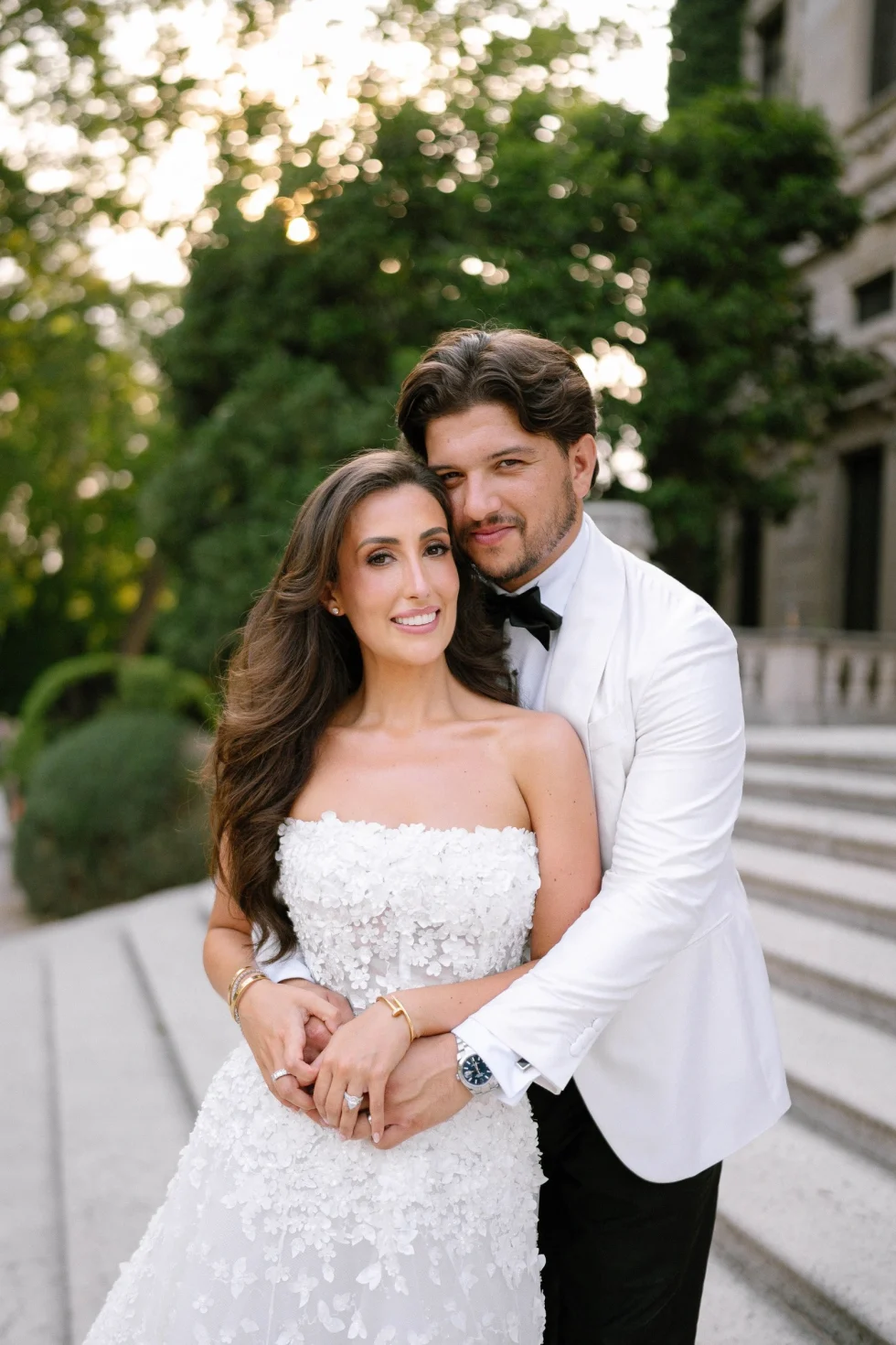 Renee and Tino on the steps of Villa Erba, Lake Como, photographed by Cinemotions Films