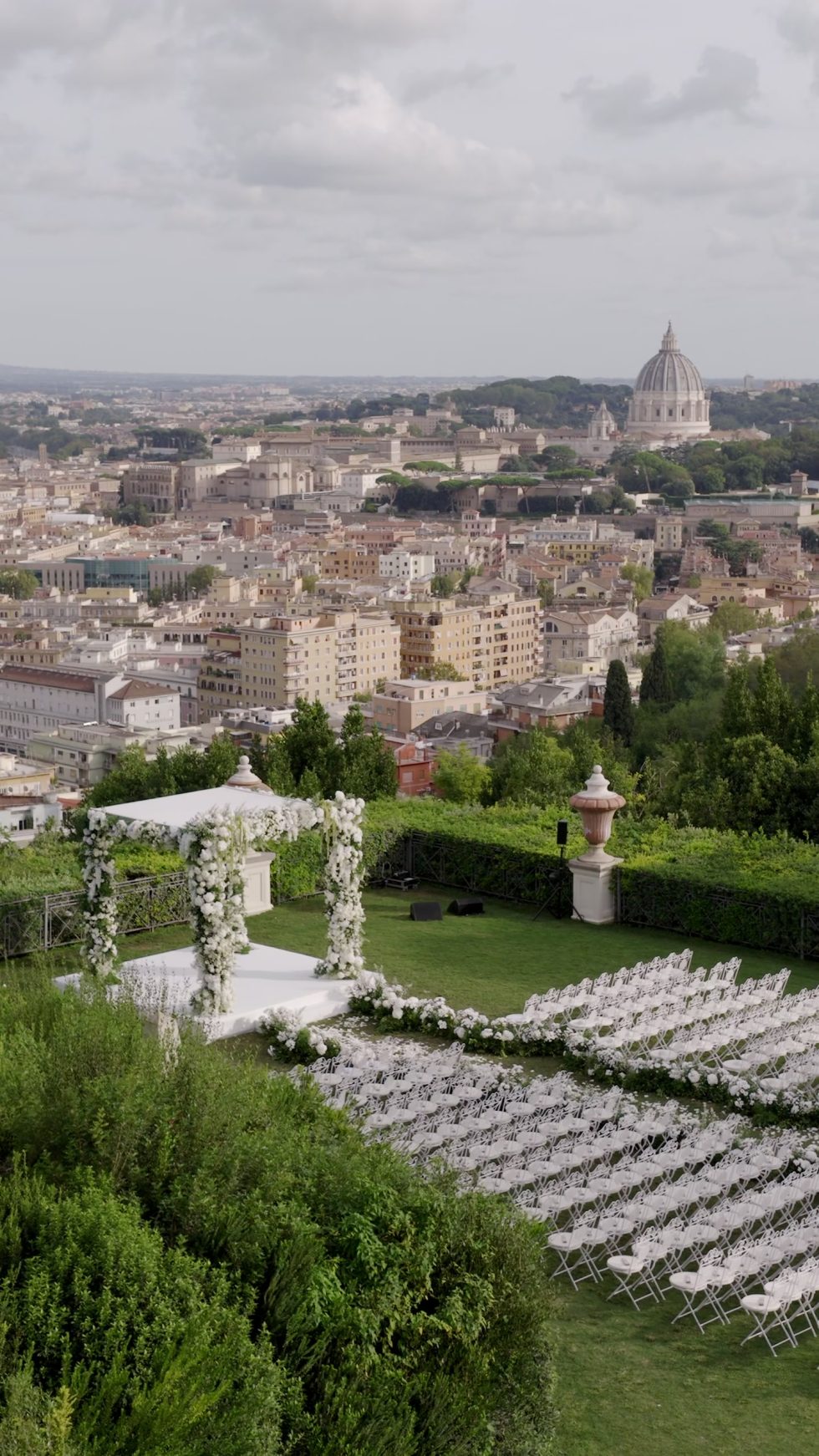 The wedding ceremony set on the lawn of Villa Miani overlooking Rome and St Peter's