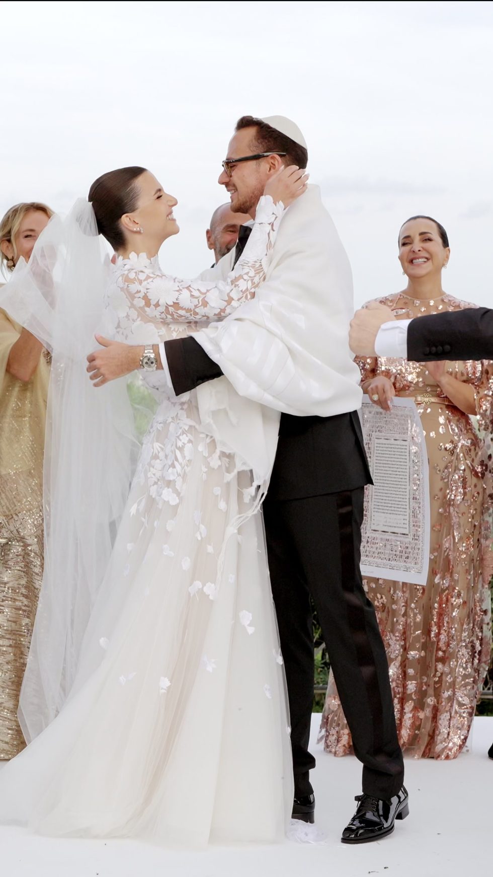 The newlyweds embracing after the ceremony at Villa Miani, Rome