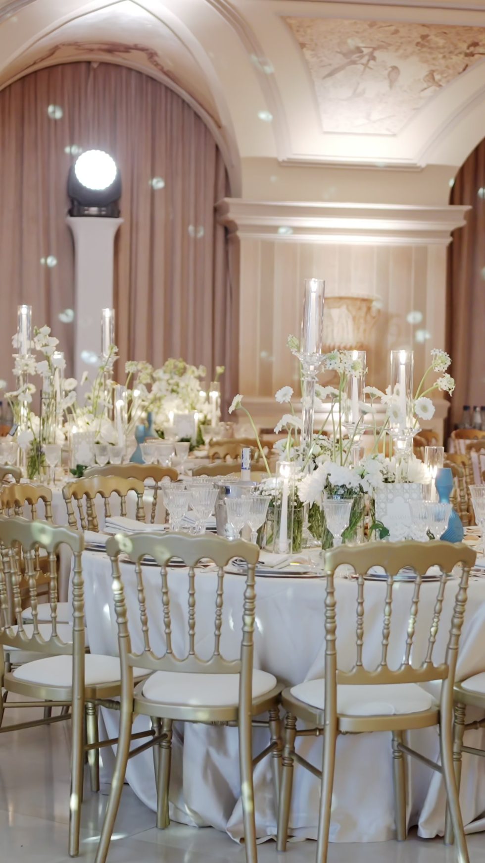 The candlelit reception tables in the ballroom of Villa Miani