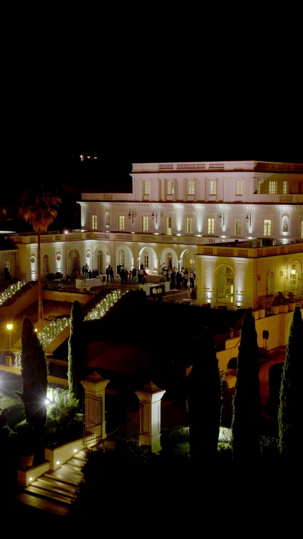 Villa Miani illuminated at night above Rome