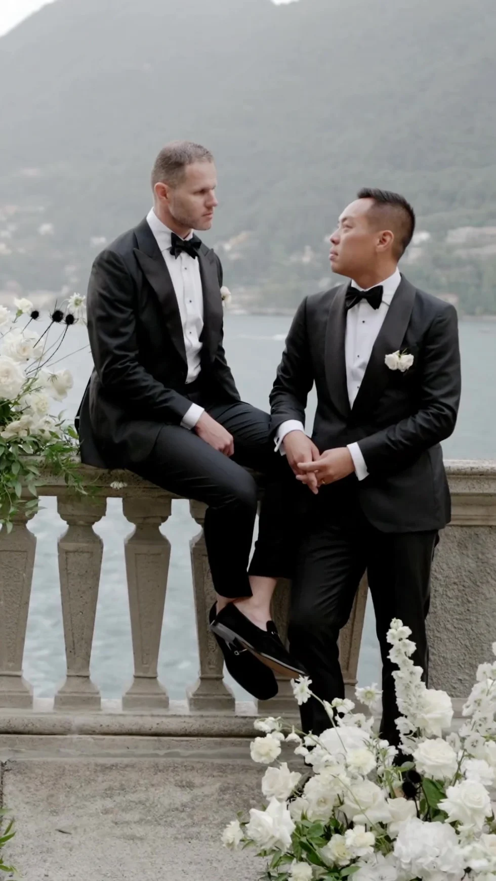 Dan and Christian on the balustrade above Lake Como