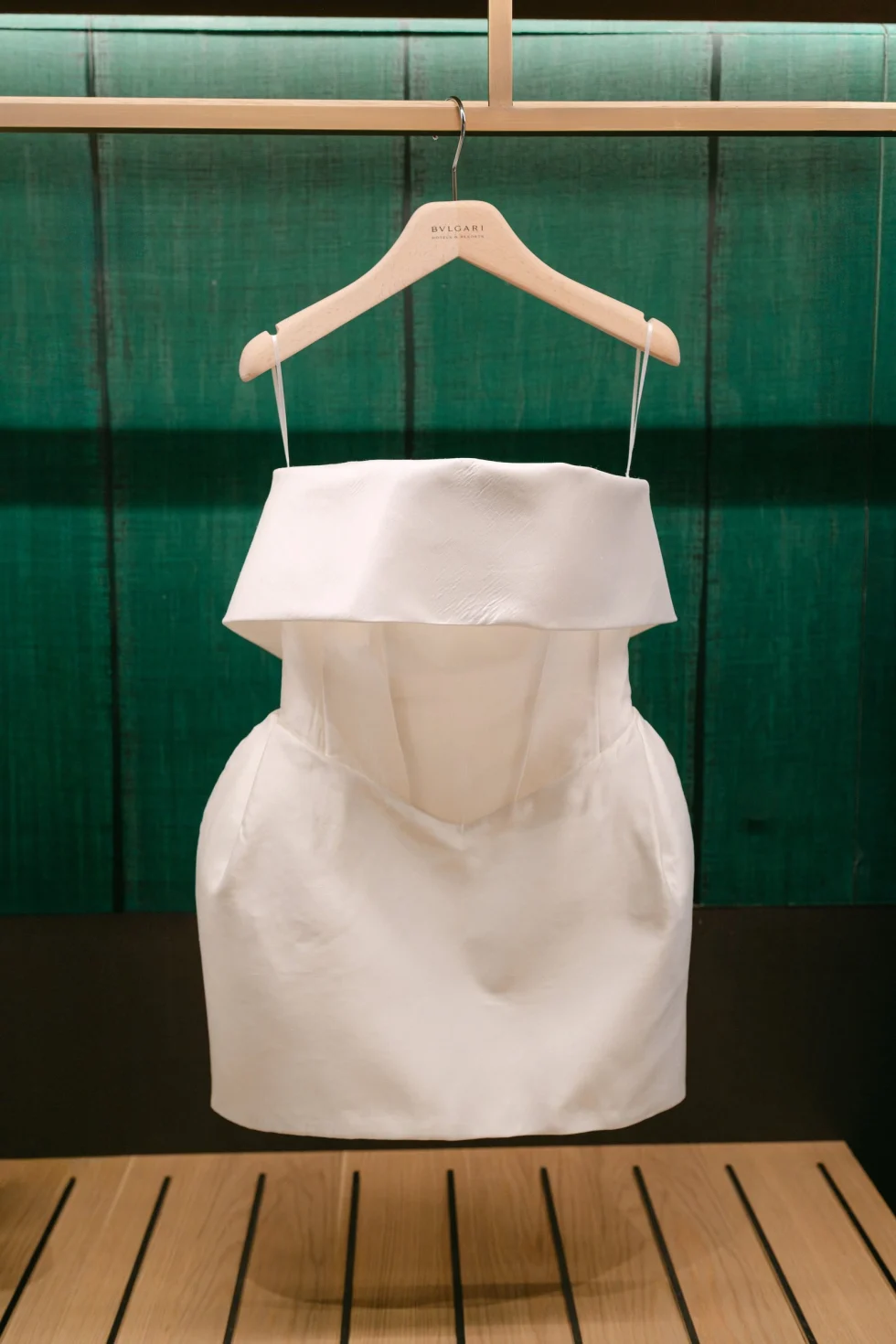 Tania's white dress hanging in the Presidential Suite before the welcome dinner, Bulgari Hotel Roma