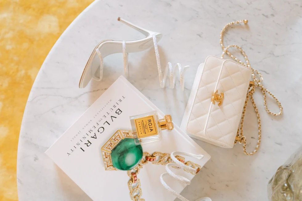 Bvlgari jewelry, shoes and bag laid out for the luxury welcome dinner in Rome
