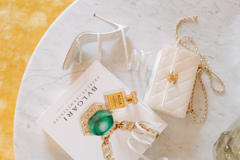 Bvlgari jewellery, shoes and bag laid out for the luxury welcome dinner in Rome