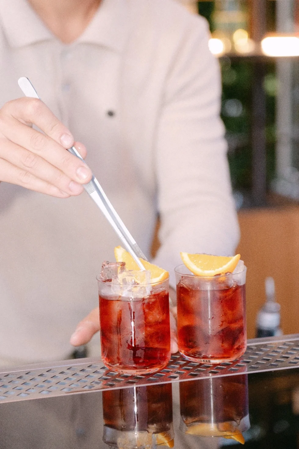 Negroni cocktails prepared at the bar of the Bulgari Hotel Roma for the luxury welcome dinner