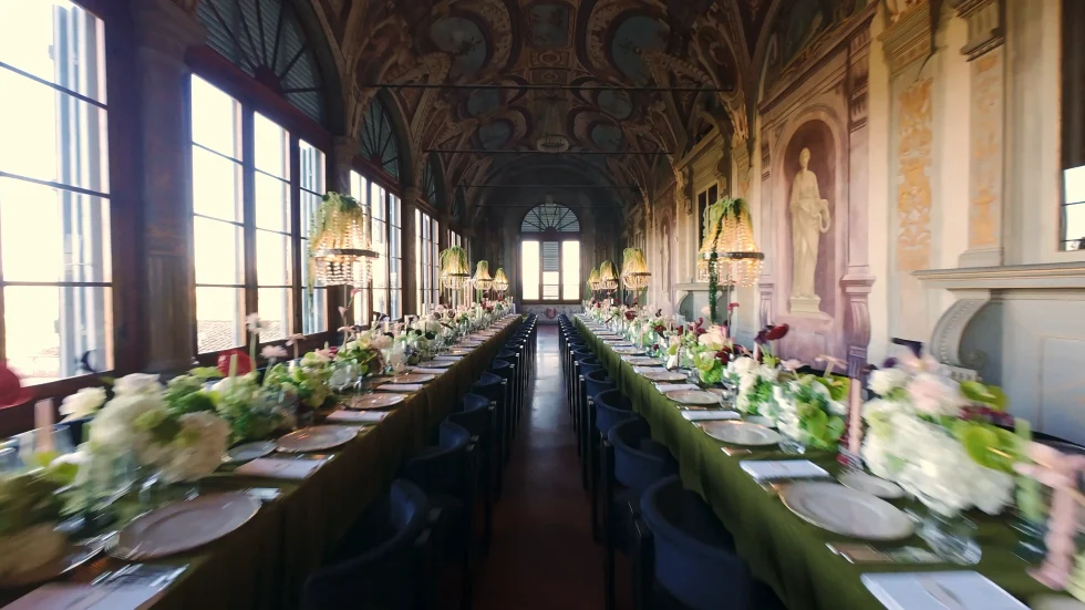 Jenna in the frescoed loggia of Villa Corsini, set for the wedding dinner
