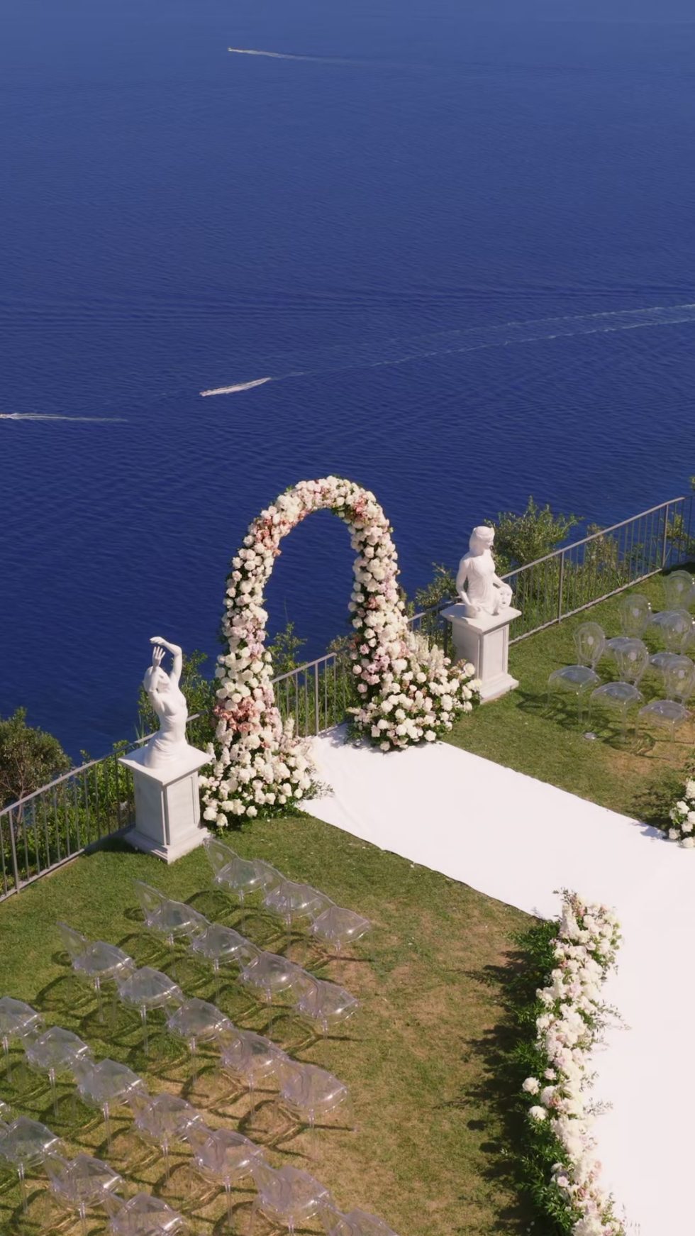 The floral ceremony arch overlooking the sea at La Rondinaia, Ravello