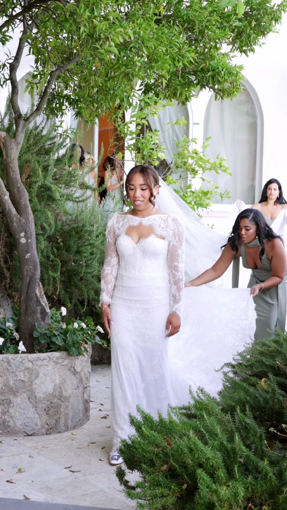 The bride in her lace gown and veil before the ceremony at La Rondinaia, Ravello