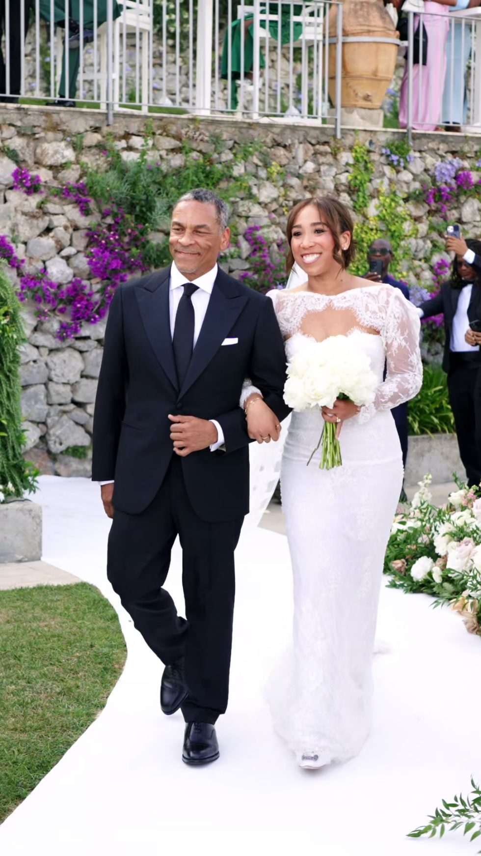 The bride escorted down the aisle at La Rondinaia, Ravello