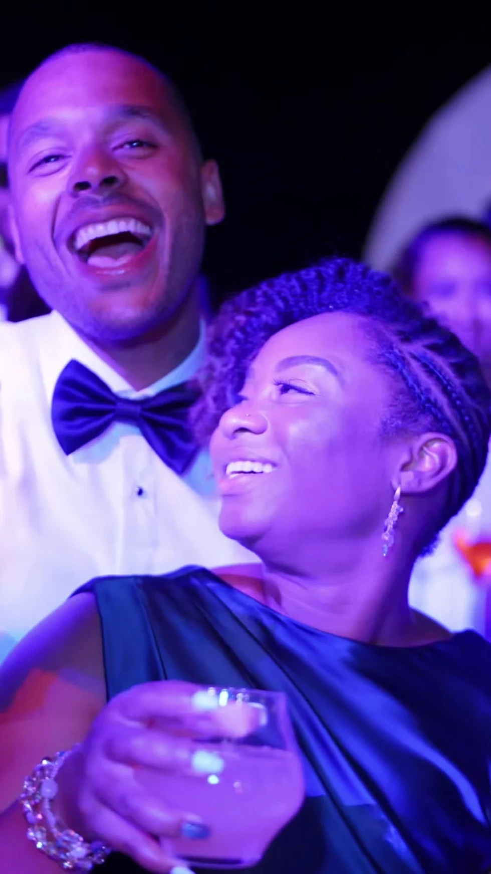 Guests laughing on the dance floor at the La Rondinaia wedding party